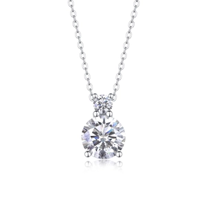 Detail of the silver S925 necklace with dual round-cut moissanite stones and elegant reflection