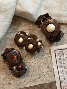 Detailed view of handcrafted coconut shell and wooden beaded bohemian bracelets set