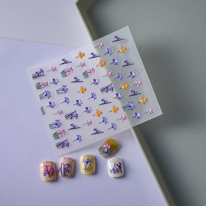 Detailed 5D embossed iris flower nail stickers with 3D floral effect and sample tips