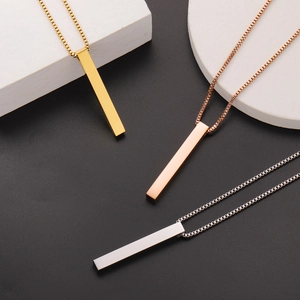 Three minimalist stainless steel vertical bar necklaces in gold, silver, and rose gold