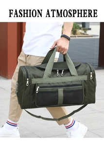 Man carrying a large capacity green travel duffel bag with shoulder strap in outdoor setting