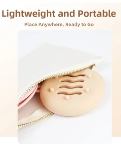 Close-up of a portable silicone makeup sponge case with hollow wave design and carrying pouch