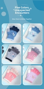 Detail view of colorful knitted children gloves with 3D star patches and soft plush texture