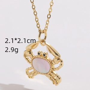 Gold crab pendant necklace with shell inlay, size 2.1x2.1cm and weight 2.9g
