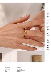 Polished 18K gold-plated minimalist streamlined open ring shown worn on index finger