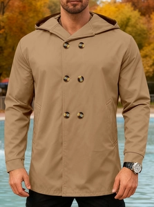 Detail of camel mid-length hooded trench coat showing double-breasted buttons and fabric