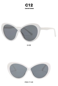 Detail view of white oval crossover frames with dark gray lenses and anti-blue light design