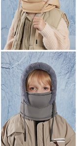 Detail of kids winter fleece-lined hood with face mask and adjustable drawstring