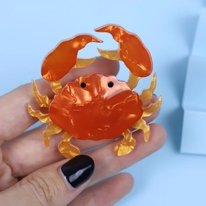 Handmade orange acrylic crab hair clip with stylish tortoiseshell finish for women