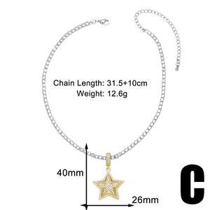 Detail view of gold star pendant necklace with cubic zirconia and exact product dimensions