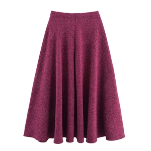 Detail view of high waist burgundy tweed A-line skirt with back invisible zipper