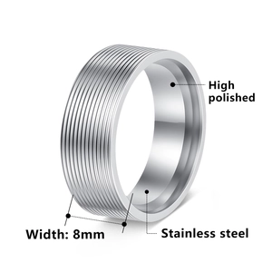 Detailed view of 8mm stainless steel ring featuring a high polished finish and grooved texture