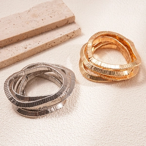 Minimalist geometric textured stretch metal bracelets in elegant gold and silver finishes