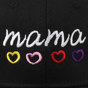 Black cotton baseball cap featuring embroidered mama text and four colorful hearts