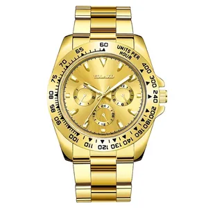 Detailed macro view of the gold business watch dial with luminous hands and chronographs