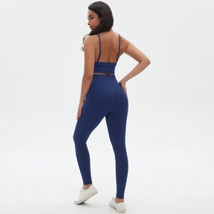 Seamless high-waisted yoga set with strappy sports bra and leggings in navy blue