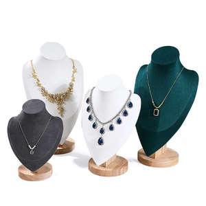 Multi-colored necklace display stand set with wooden base and elegant velvet mannequins