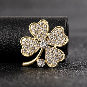 Elegant gold four-leaf clover brooch with sparkling crystal rhinestones for women