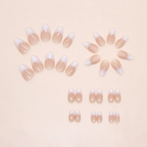 Short almond press on nails with elegant white gradient French manicure design