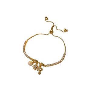 Gold-plated cross and pearl bracelet with adjustable slider chain and zircon stones