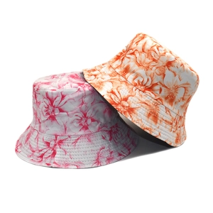 Floral print reversible bucket hats in pink and orange colors for women summer sun protection