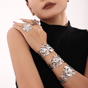 Statement silver flower textured open bangles and matching rings for women