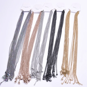 Detail of 2mm stainless steel cross chains in various colors with lobster clasps