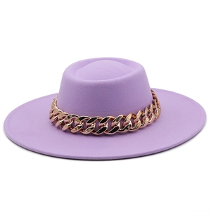 Close-up of purple wool fedora hat featuring a wide brim and chunky rose gold chain detail