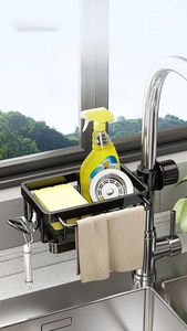 Detail of black aluminum faucet rack with drip tray and towel bar for sink storage