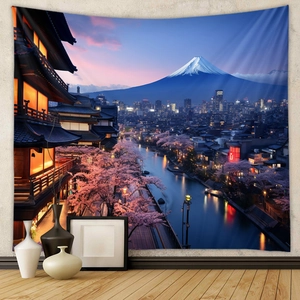 Detail of Mount Fuji and cherry blossom tapestry hanging on a textured wall decor