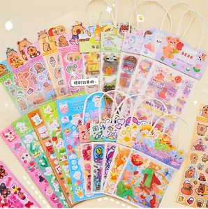 Close-up of cute cartoon PET stickers set with diverse characters and matching paper bags