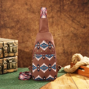 Aztec Bohemian crossbody chest bag with ethnic geometric patterns on dark brown base
