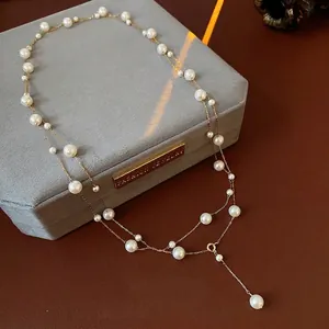 French vintage double layer pearl necklace with golden chain and round pendant charm