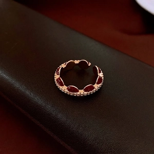 Elegant rose gold adjustable ring with deep red stones and white zircon micro-pave