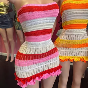 Detail of colorful striped crochet tube dress with hollow-out knit and ruffled hemline