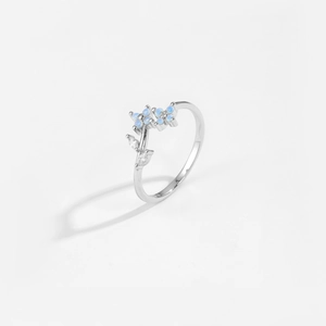 Adjustable S925 sterling silver ring featuring delicate blue floral and leaf design