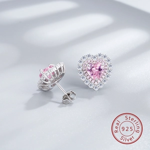 Detailed macro of S925 sterling silver pink heart-cut halo stud earrings set