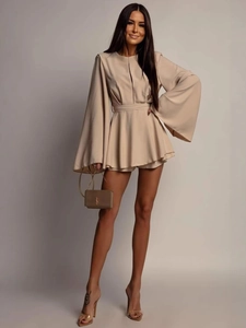 Elegant beige V-neck long sleeve mini dress with dramatic flared cuffs and tie waist belt