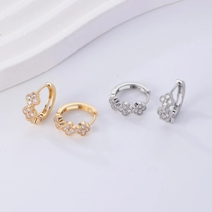 Elegant gold and silver flower hoop earrings with sparkling cubic zirconia crystals