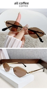 Detailed close-up of retro geometric cat-eye sunglasses with gold metal frames and coffee lenses