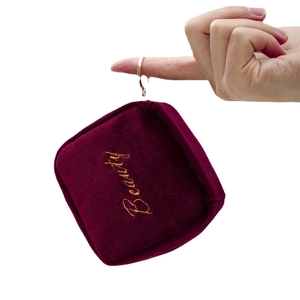 Burgundy velvet mini lipstick pouch with gold Beauty embroidery and metal ring