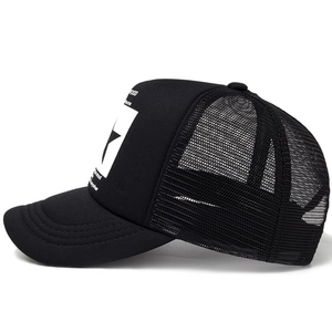 Black mesh trucker hat with white star print and breathable adjustable snapback design