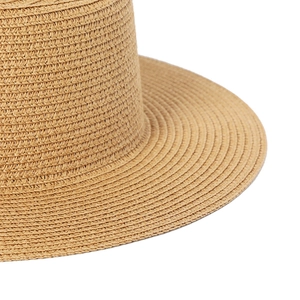 Close-up of khaki boater hat showing detailed spiral woven texture and flat brim structure