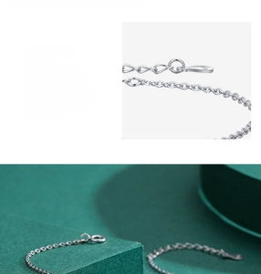 Macro detail of S925 sterling silver chain with lobster clasp and extension link