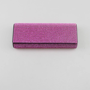 Luxury rectangular glasses case covered in pink rhinestones with black base and hard shell