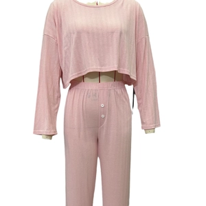 Women's pink knit long sleeve top and pants lounge set with ribbed texture