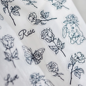 Autocollants d'art d'ongles style japonais avec croquis de roses et lapin noir et blanc