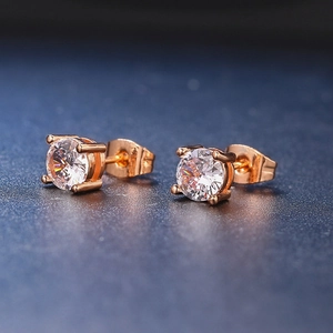 Classic round cubic zirconia stud earrings with four-prong setting in rose gold finish