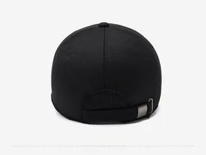 Rear view of black baseball cap showing cotton twill fabric and adjustable metal buckle