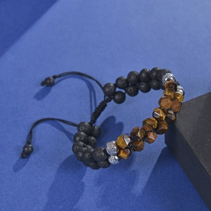 Detail of 8mm double-layer hematite and tiger eye beaded bracelet with adjustable cord